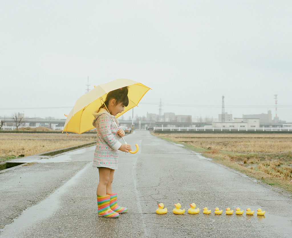 little girl with duckies