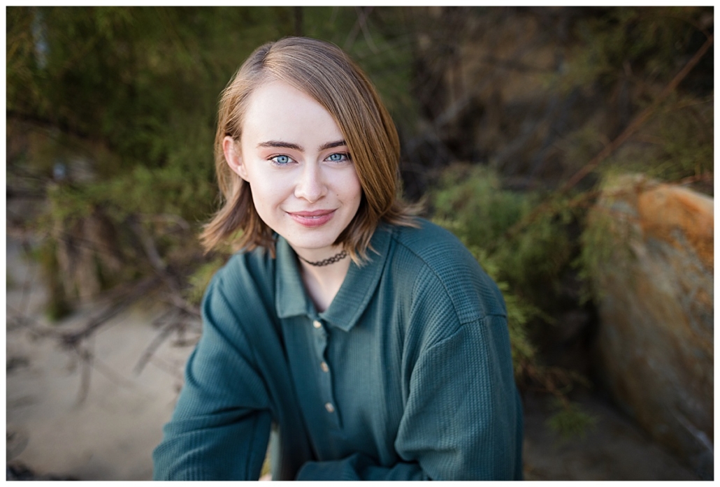 High school senior girl photographed on the beach in 80s fashion in Laguna Beach 