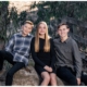 Three kids posing in Laguna Hills for a family photography shoot.