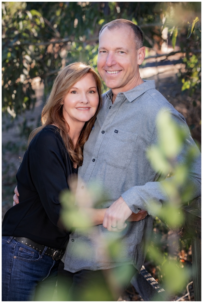 Husband and wife posing for their family photography session in Orange County