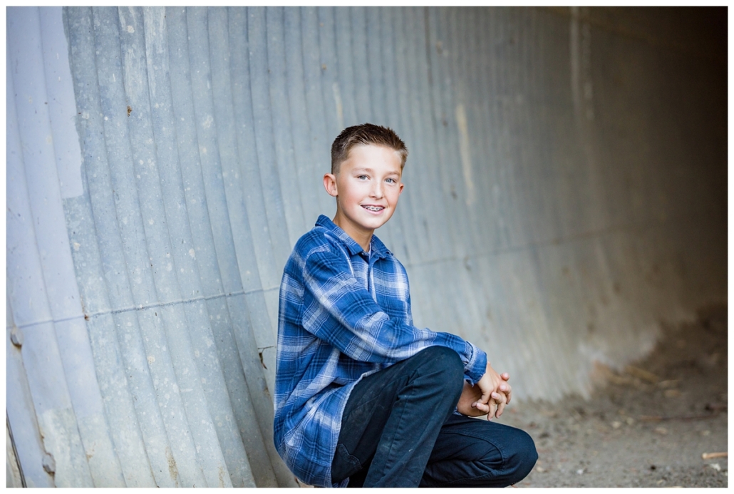 Orange County school age boy posing for professional pics.