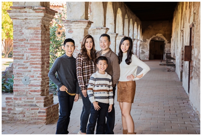 Orange County Family photo shoot at the Mission in San Juan Capistrano. The clothing for the session is Fall inspired with lots of layers and textures.