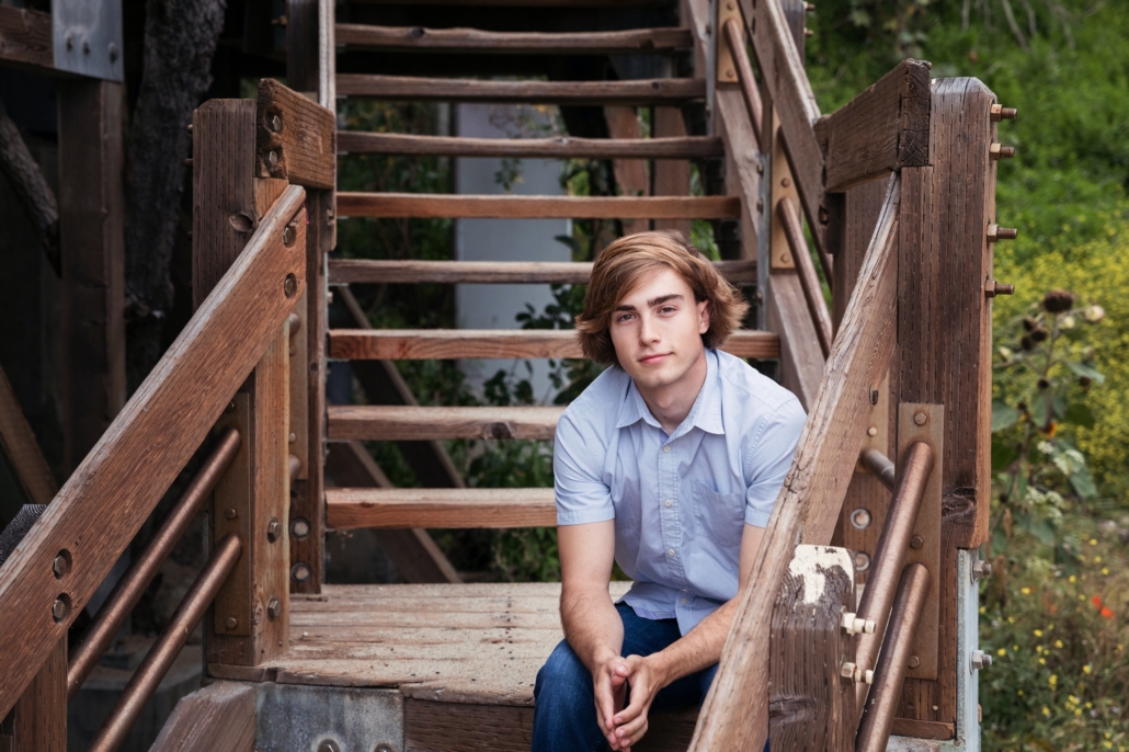 High School senior portrait session on old stairway.