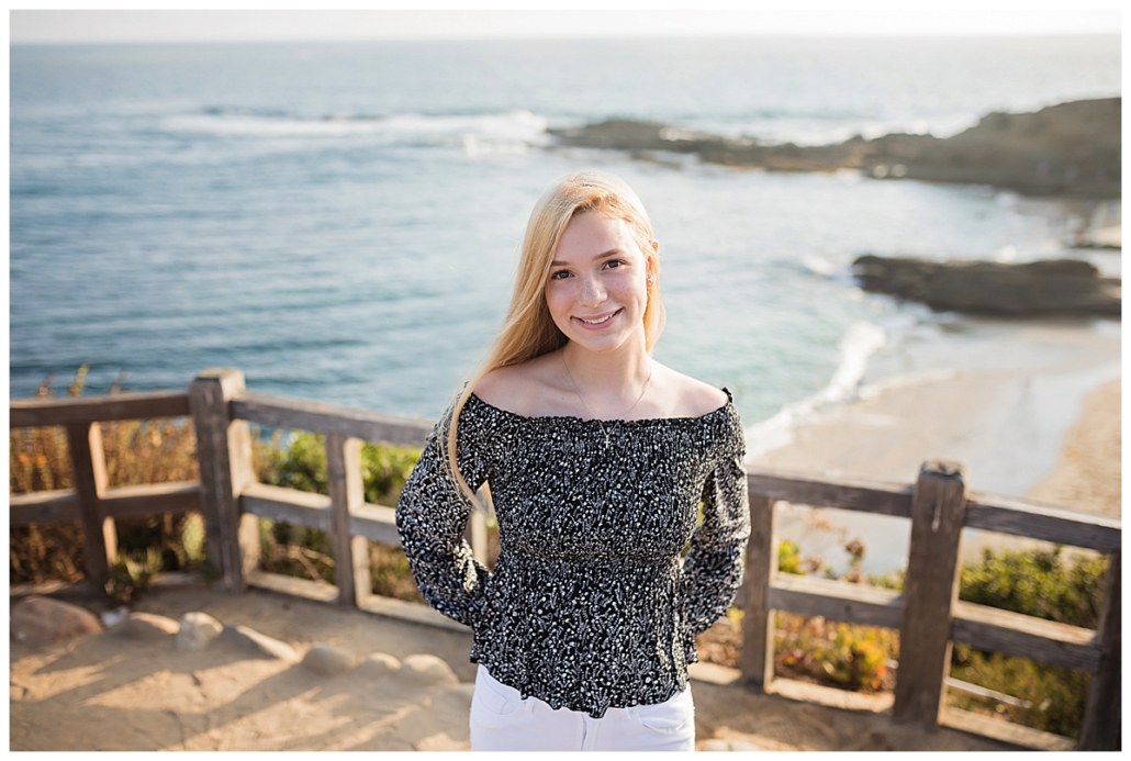 High school senior girl portraits on the bluff overlooking treasure island beach in Laguna Beach