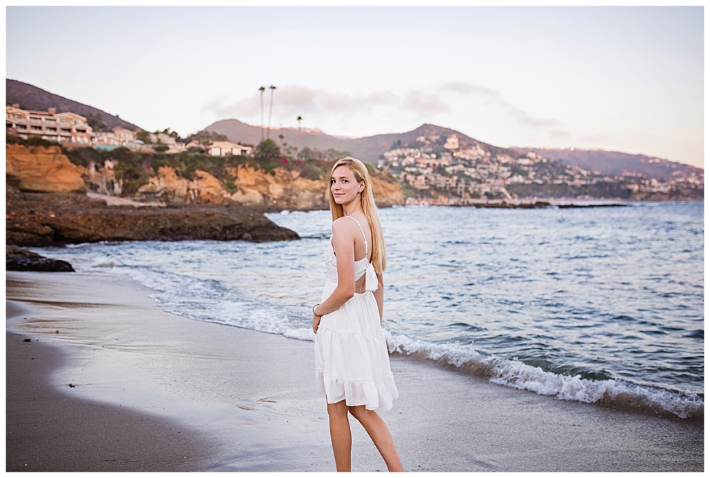 playing in the waves in Laguna Beach High School senior pics