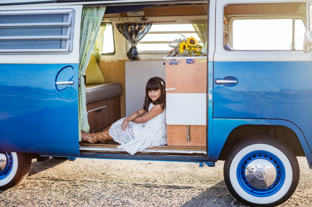 Young girl modeling in a vintage VW van