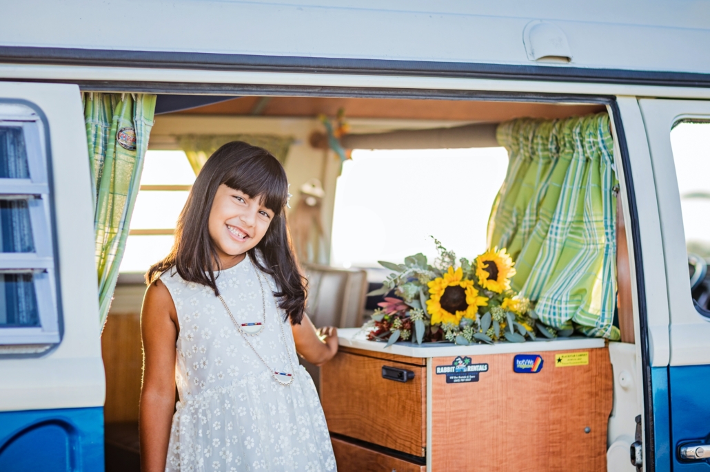 Sweet girl in a vintage vw van in Huntington Beach CA