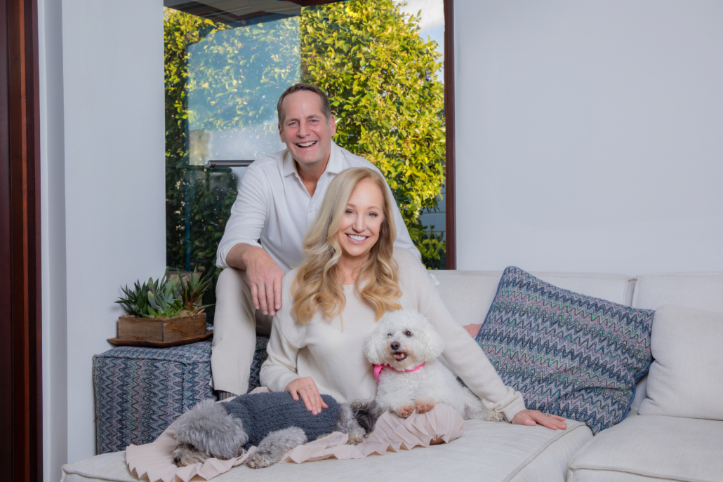 Family photography session in the home of Harley and Kaira Rouda in Emerald Bay where we show the posing with their pets on their living room couch