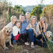 Family of six photography session in San Juan Capistrano including their two golden retriever dogs