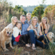 Family of six photography session in San Juan Capistrano including their two golden retriever dogs