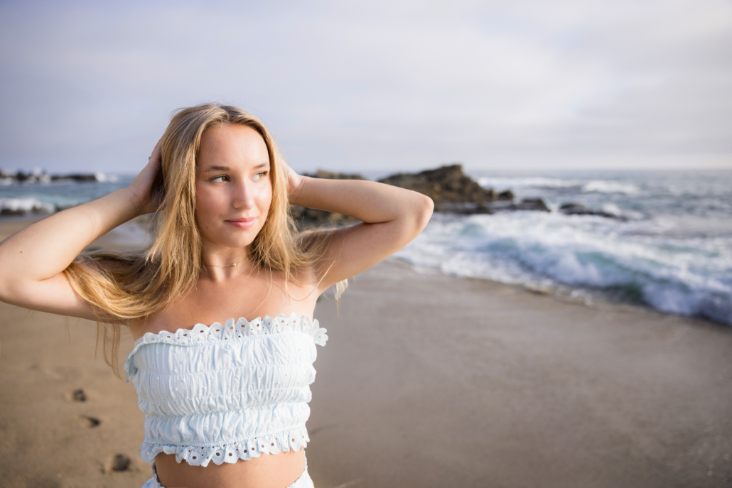 Michigan high school senior who traveled to Laguna beach for her senior portrait session. We photographed the session on Tablerock beach at sunsest.