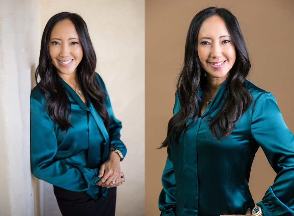 Image of a C-suite professional woman executive in a bold green fitted blouse. This image represents what to wear to a corporate photography session.