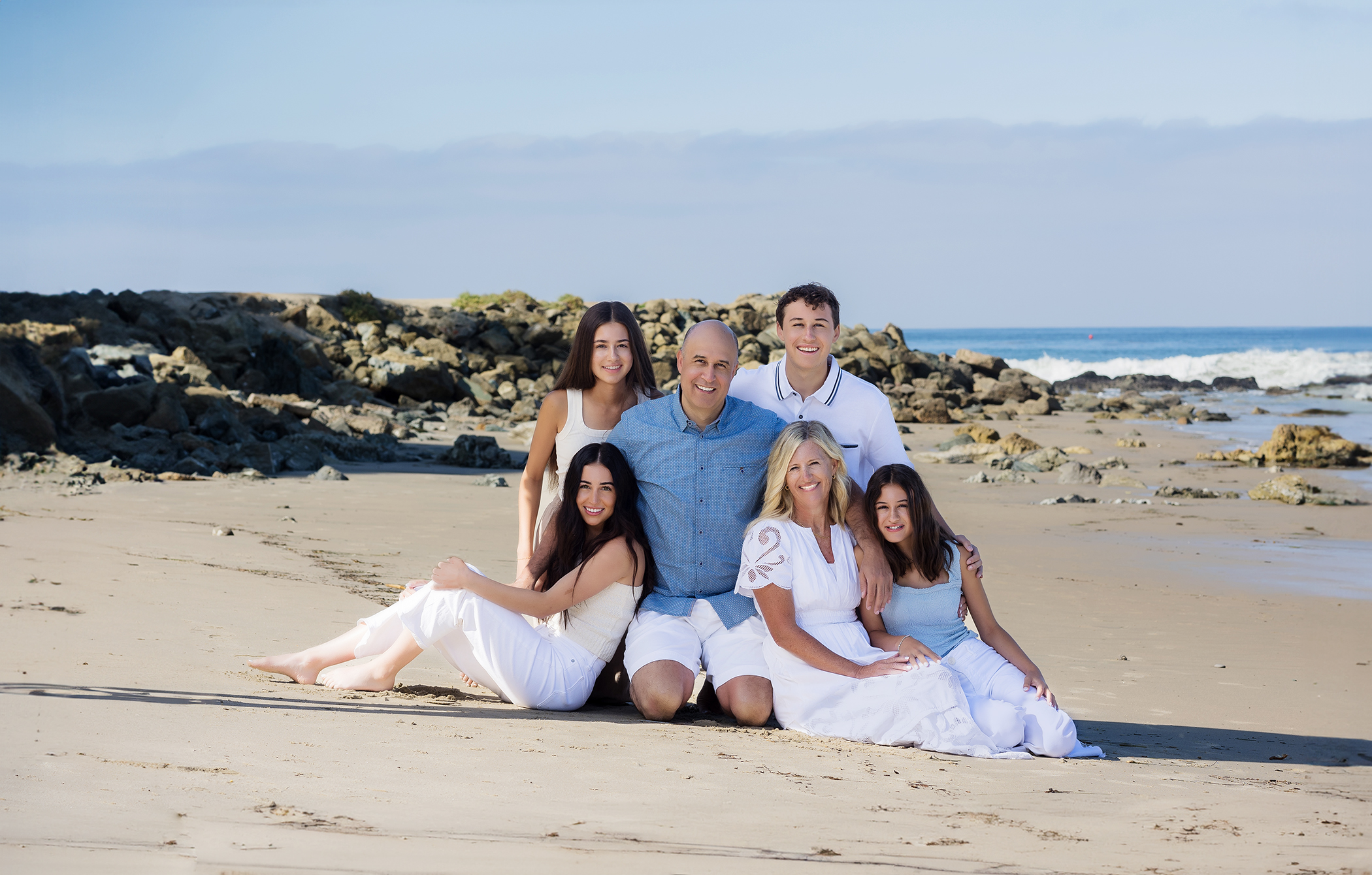 Strands in Dana point is the perfect spot for your summer family photos on the beach.