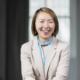 What to wear for accessories to a female corporate headshot photography session. Understated earrings a a soft color scarf is a great choice for your photography shoot.