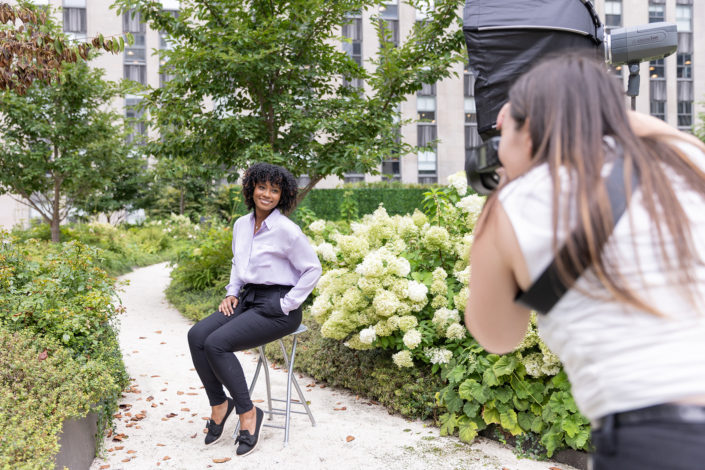 Behind the scenes of a corporate outdoor photoshoot at Rockefeller Center in New York City.