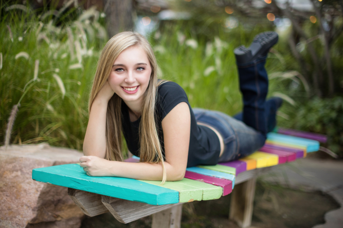 An artistic senior portrait in a unique environment at the camp anti mall