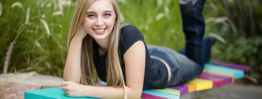 An artistic senior portrait in a unique environment at the camp anti mall