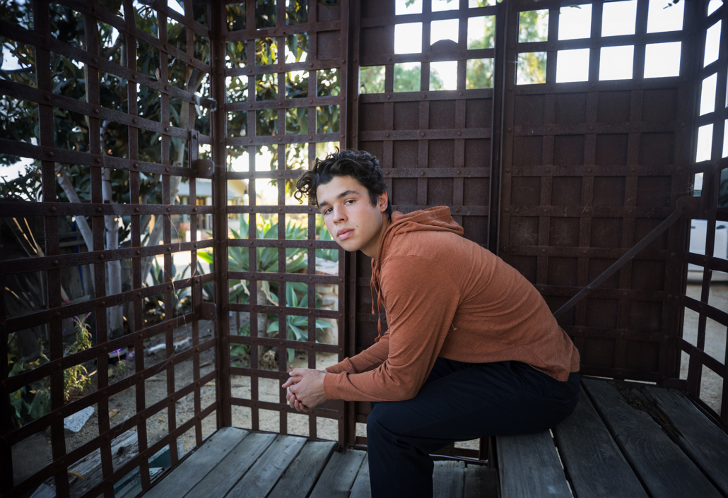 image of a senior in san juan capistrano using a one of the variety of backgrounds.