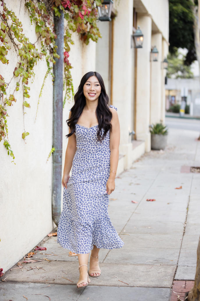 Fun senior pose walking in the streets and alley ways of Laguna Beach