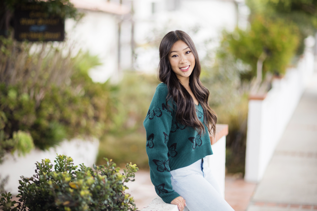 Fun spot in downtown Laguna Beach for a high school senior portrait in front of the water district gardens.