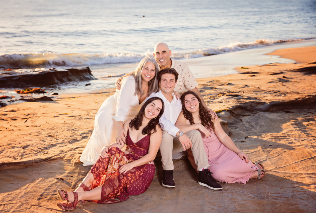 Family photo session at Picnic beach at sunset in Laguna Beach.