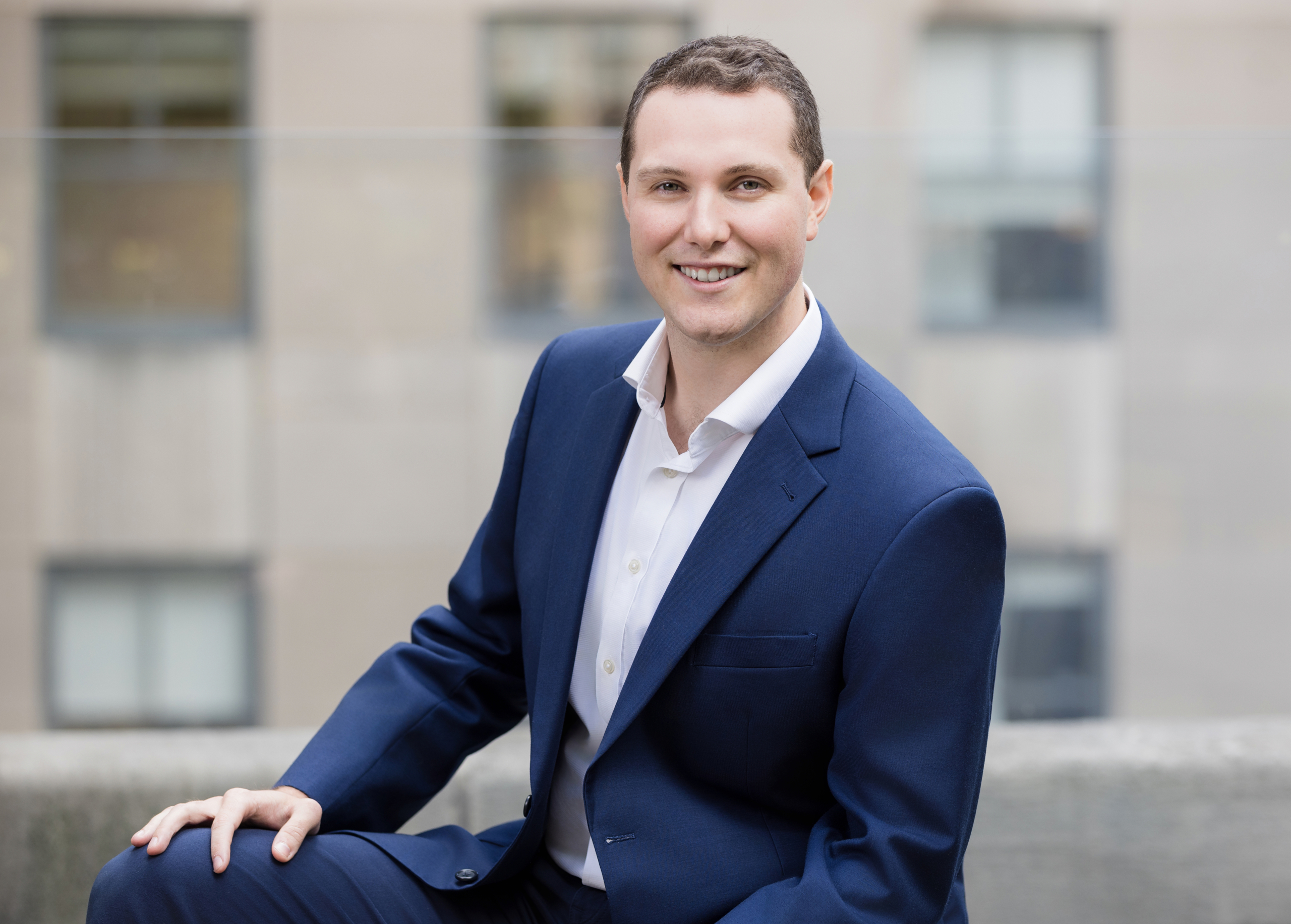 client wearing classic suit from men’s headshot style guide