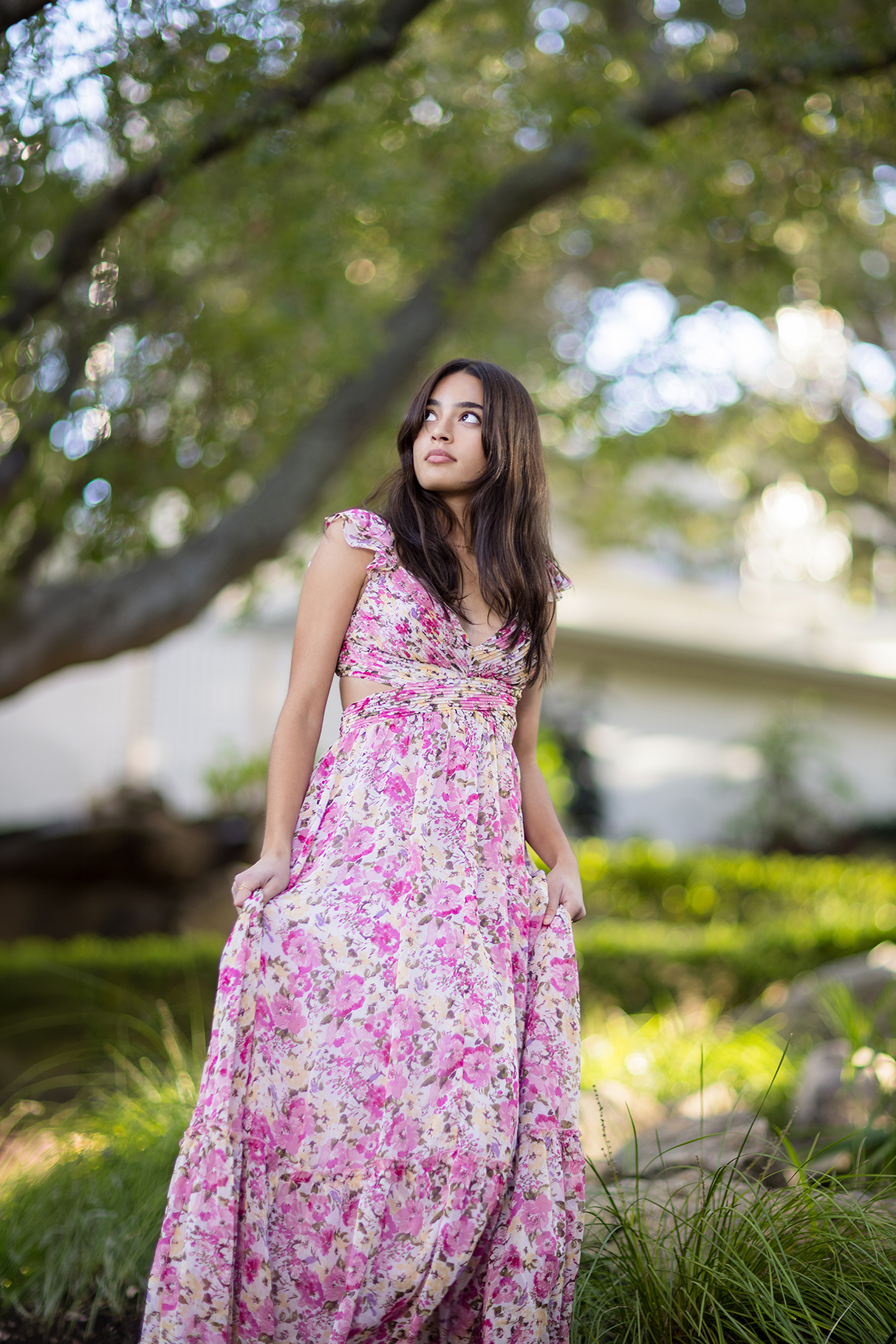 Senior wearing a flowy dress during a beach senior session in Laguna Beach.